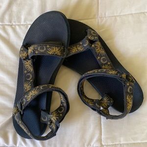 Tevas Sun and Moon print sandals
